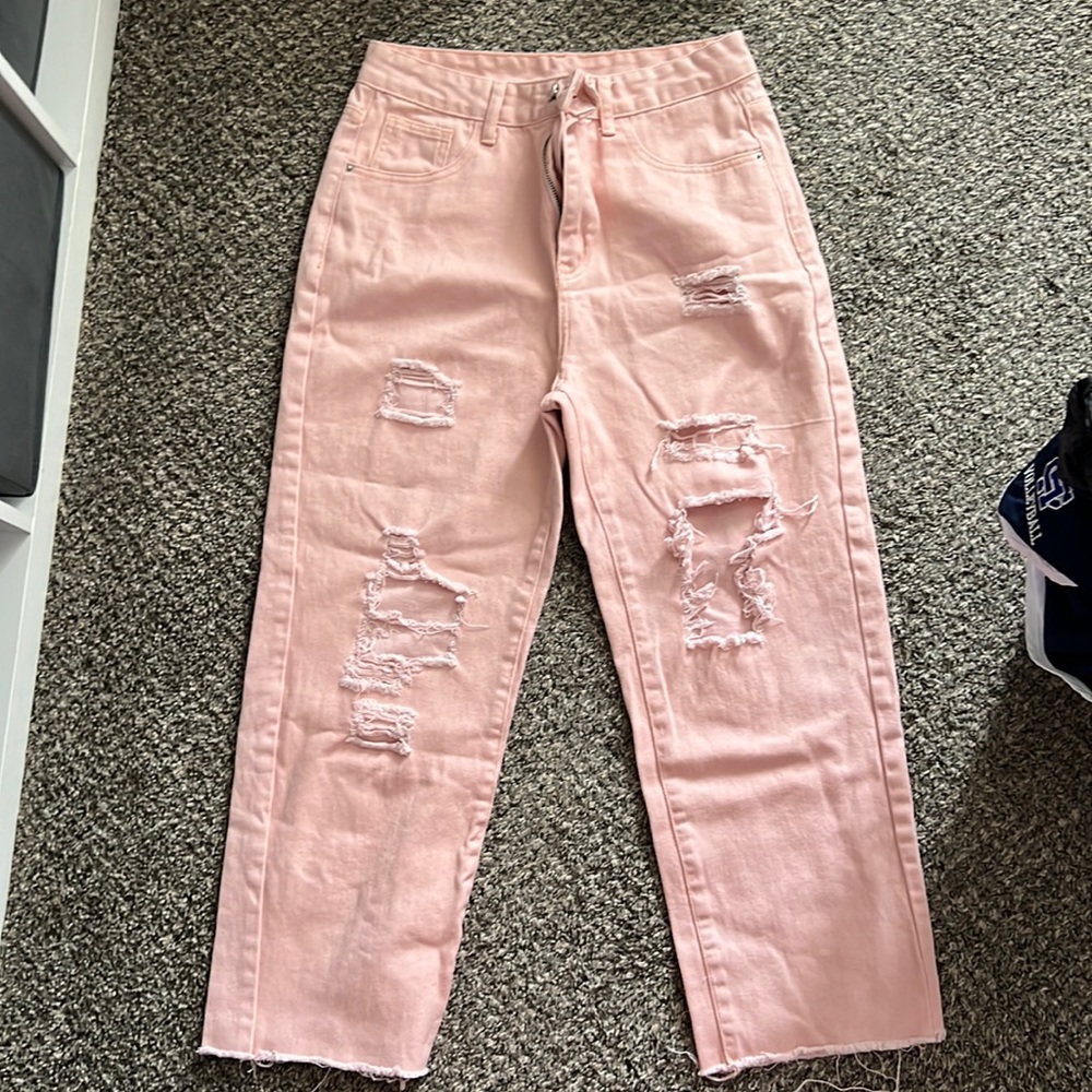 Pink tattered straight leg jeans